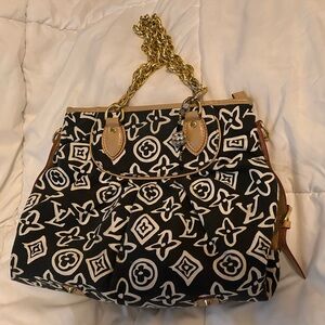 Black and white with gold chains shoulder bag